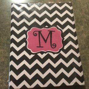 Large monogrammed notepad holder with notepad.